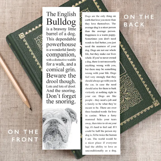 Book with text and a bulldog illustration on a textured surface