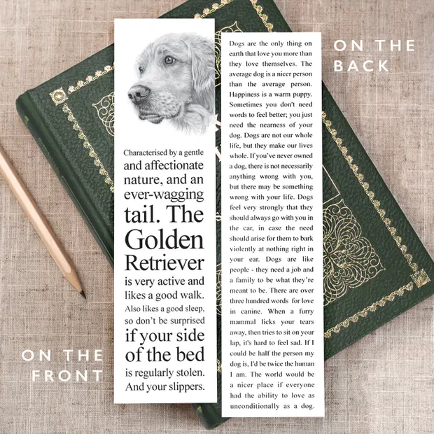 Book with a bookmark featuring a dog illustration and text on a textured surface