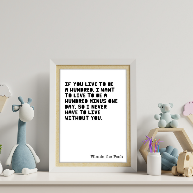 Framed print with a quote on a shelf with toys and decor